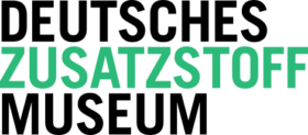 Grüne, fette Großbuchstaben ergeben auf transparentem Hintergrund „ZUSATZSTOFF“ und spiegeln das FRoSTA Reinheitsversprechen für Tiefkühlprodukte wider.